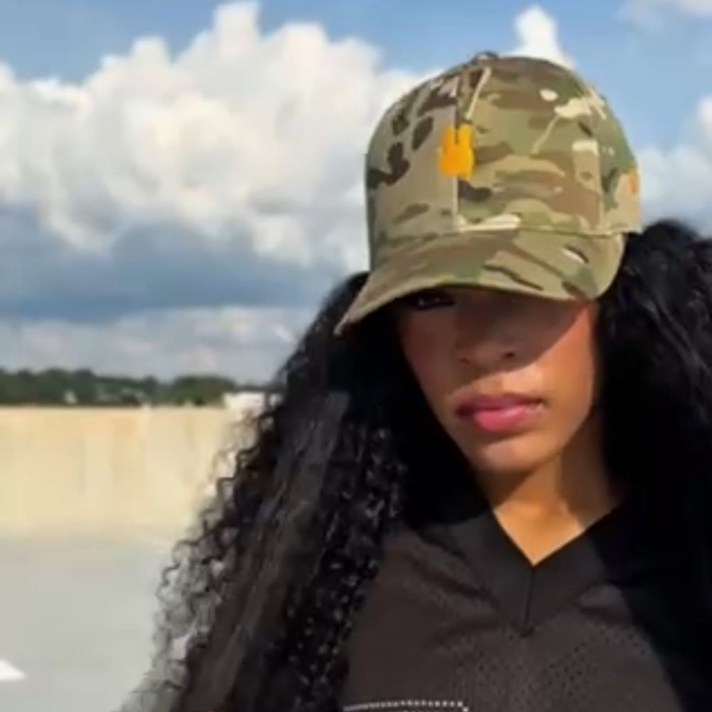 Divine Turner photo with SnapBack Camo Hat