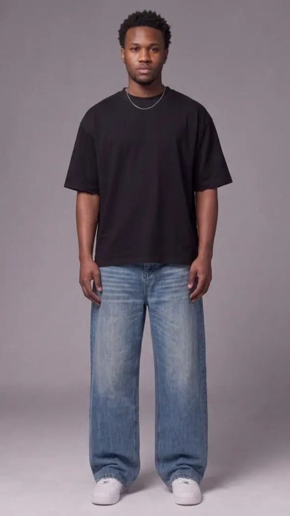 Men’s baggy jeans: model wearing Toxic NYC Sun Faded Heavyweight Baggy Jeans front view