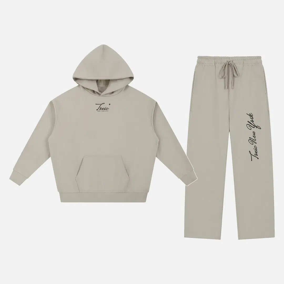 Toxic NYC Script Essential Heavyweight Hoodie & Straight Leg Sweatpants Set Light Gray Toxic NYC Script Essential Heavyweight Hoodie & Straight Leg Sweatpants Set in Light Gray, hoodie and sweatpants flat lay
