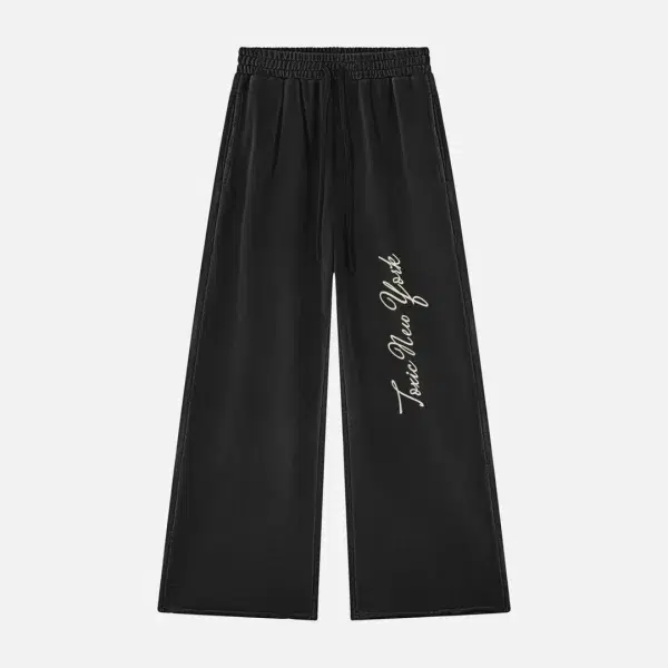 Toxic NYC Script Vintage Wash Raw Edge Sweatpants in Black, front view