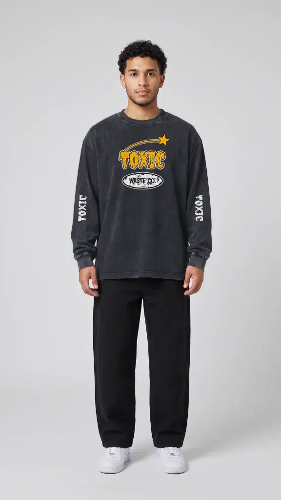 Man wearing the Toxic NYC Waste Co. Snow Washed Long Sleeve T-Shirt with baggy jeans